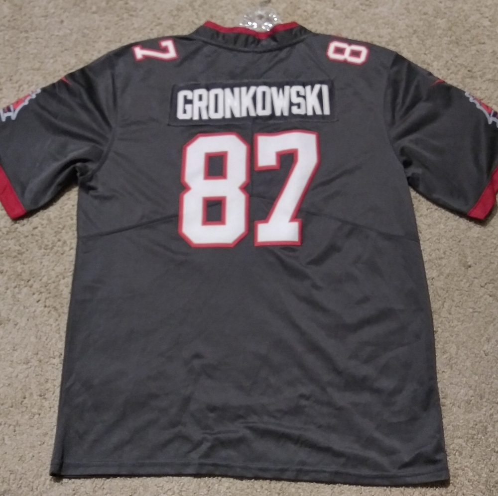 Large Nike NFL Tampa Bay Gronkowski football jersey. Gray and red.